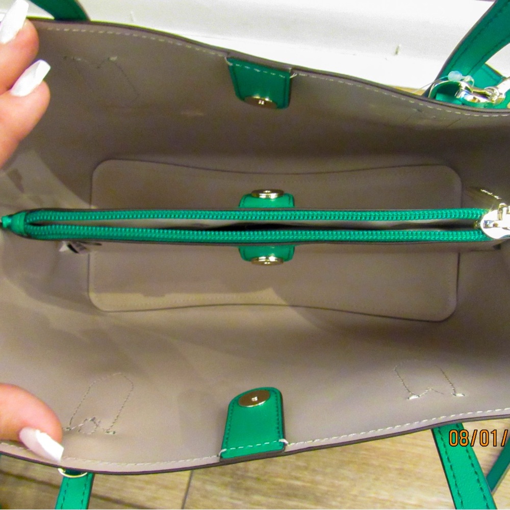 Kate Spade purse, color is a beautiful emerald green